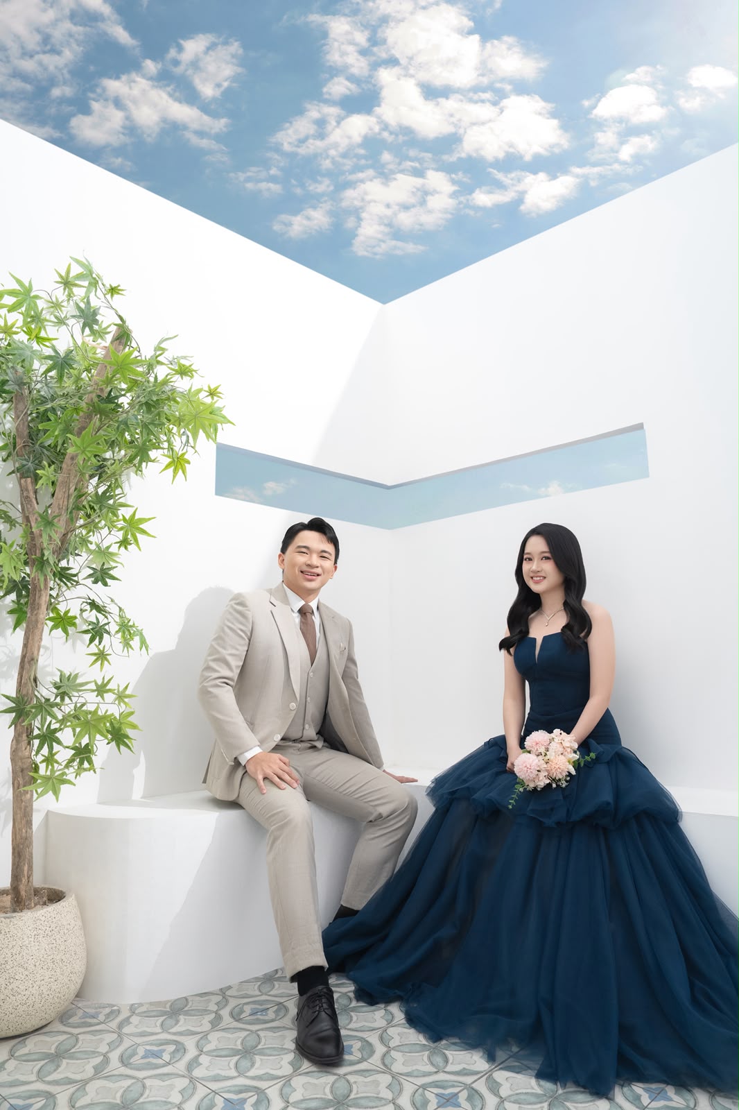 Kelwin and Christy seated beneath an open sky