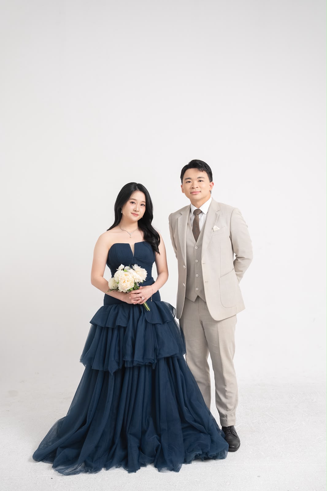 Kelwin and Christy in a bright studio